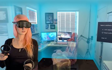 A woman using VIVE XR Elite all-in-one headset and controllers