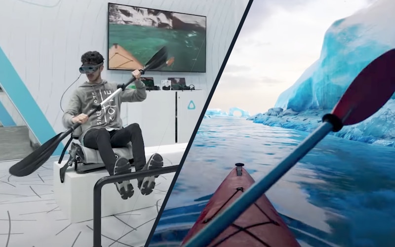 Man holding paddle with VIVE Wrist Tracker attached to enjoy a VR kayaking experience