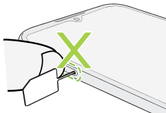 Illustration warning not to press the tray when inserting the eject tool.